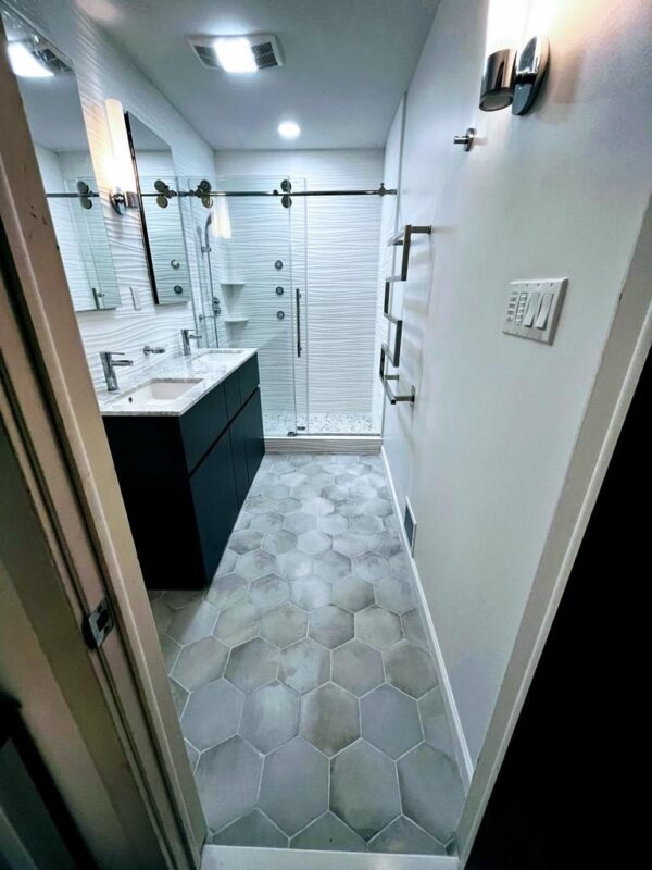 completed bathroom renovation showing modern fixtures and tile work in Philadelphia home