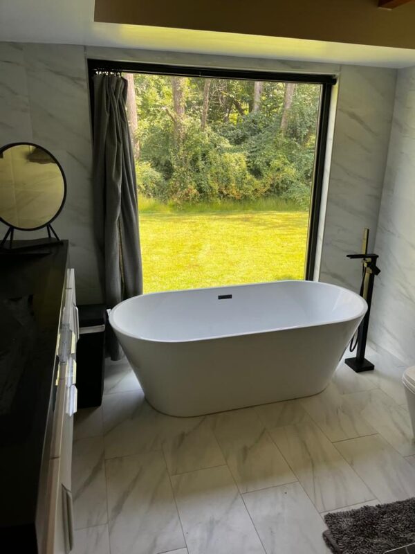 luxury master bathroom with walk-in shower and freestanding tub in Philadelphia suburb home