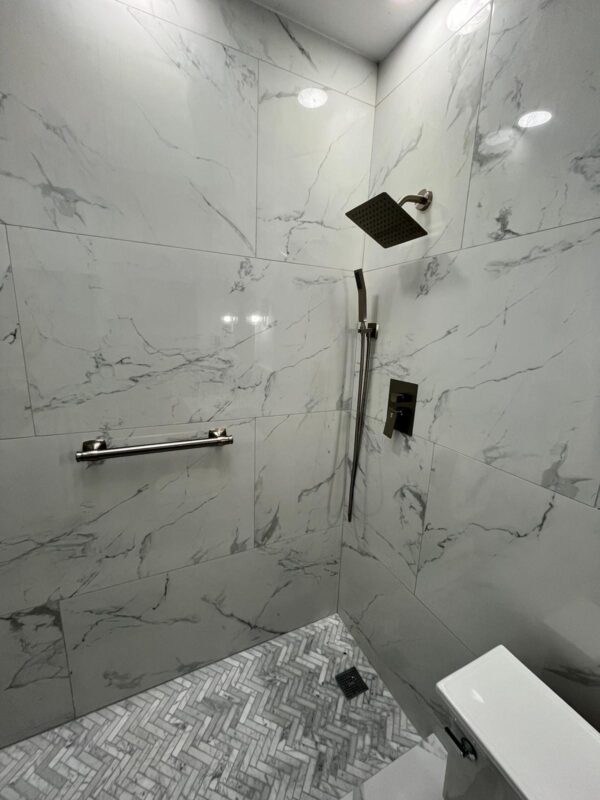 modern master bathroom remodel with double vanity and walk-in shower