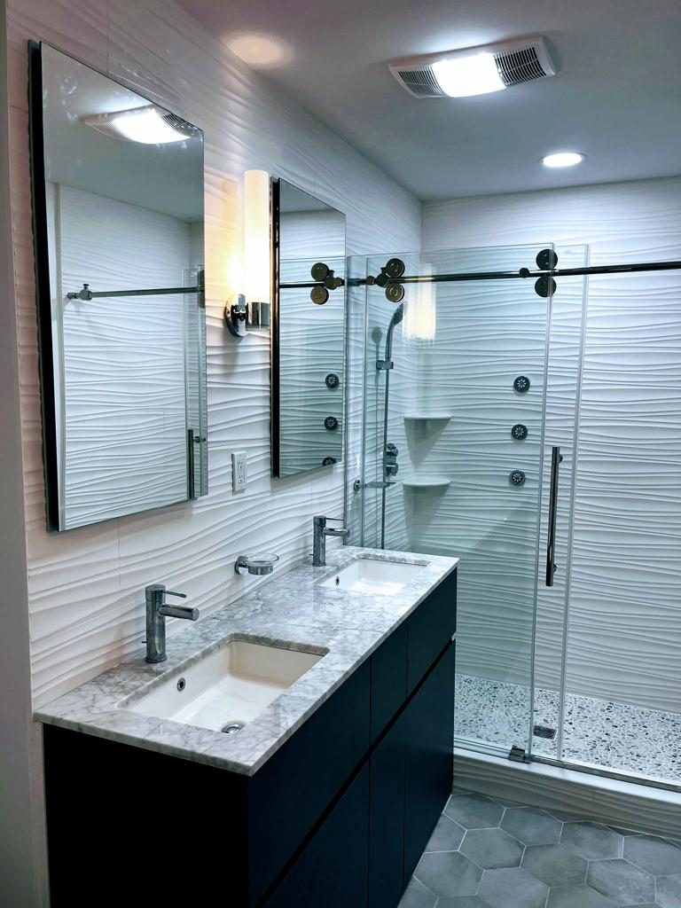 completed bathroom remodel with walk-in shower and vanity in Montgomery County PA