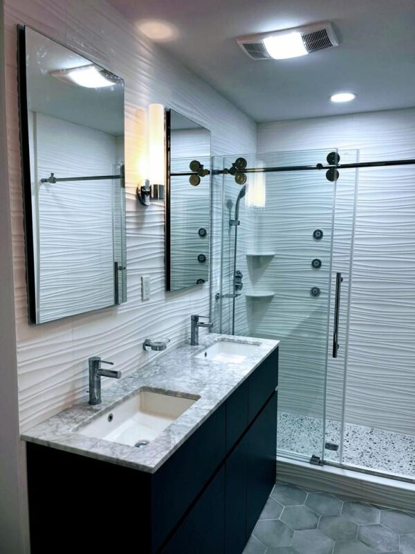 modern powder room with wall mount vanity and bold tile in Philadelphia row home