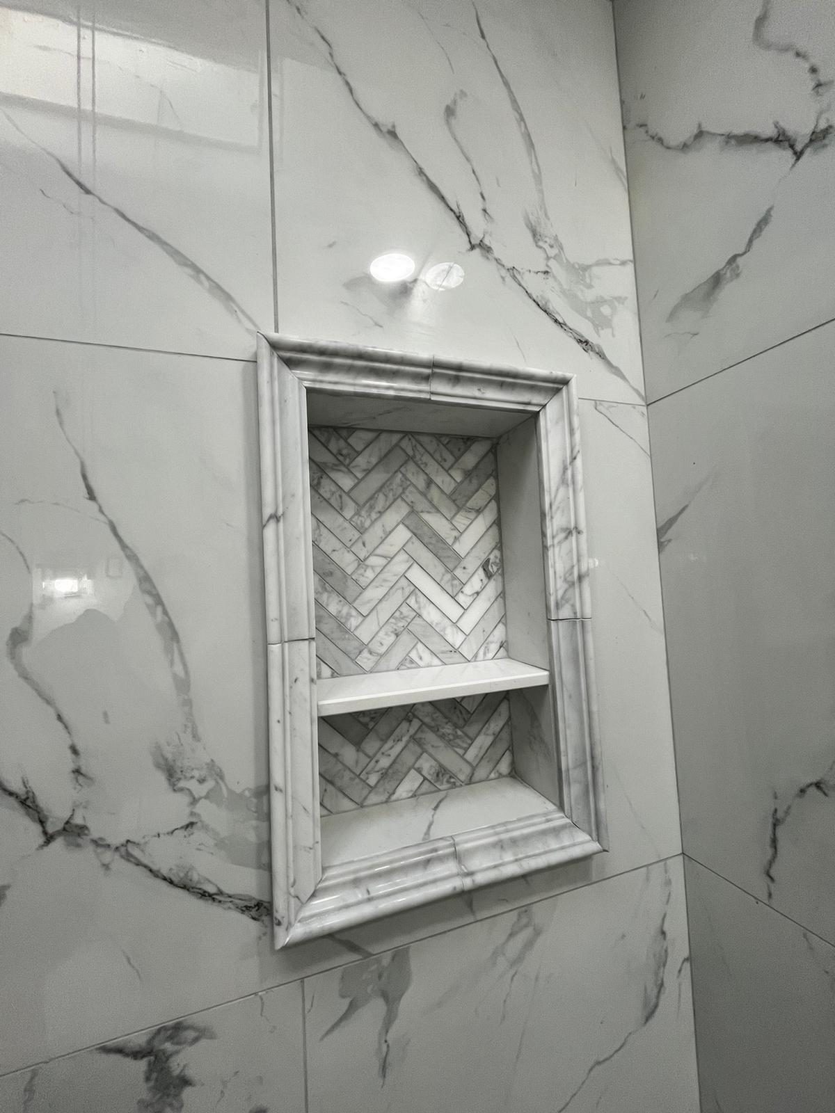 bold geometric tile accent wall in row home powder room renovation