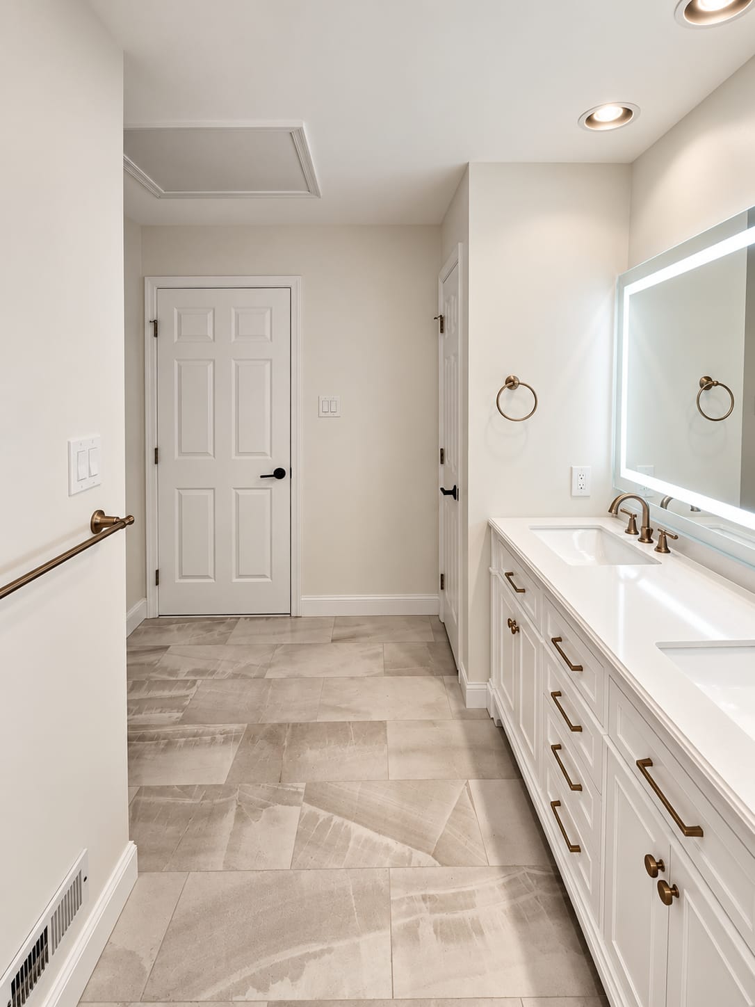 Bathroom before renovation in Ambler, PA, showing the new floor