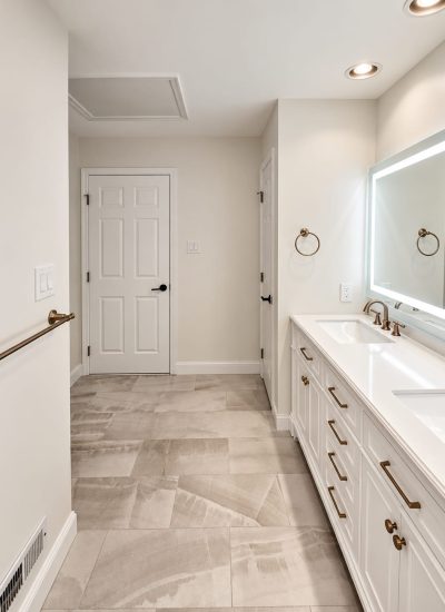 Bathroom before renovation in Ambler, PA, showing the new floor