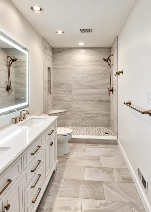 Ambler Bathroom Remodel – After Renovated bathroom in Ambler, PA, with white vanity and tiled shower
